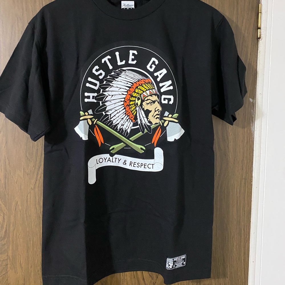 This is a Brand New Hustle Gang Black Short Sleeve Shirt. Size Medium